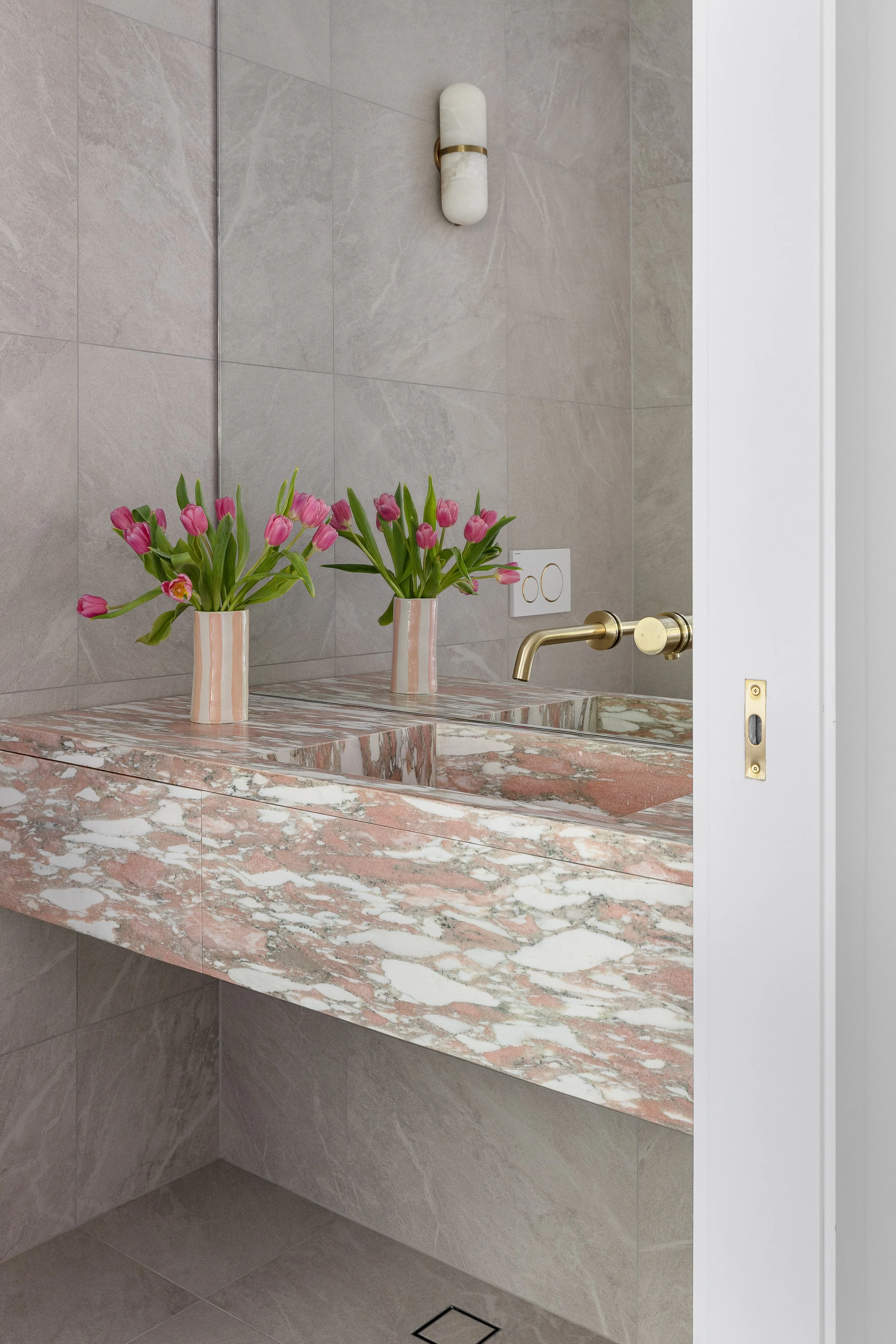 pink-marble-floating-vanity-bathroom