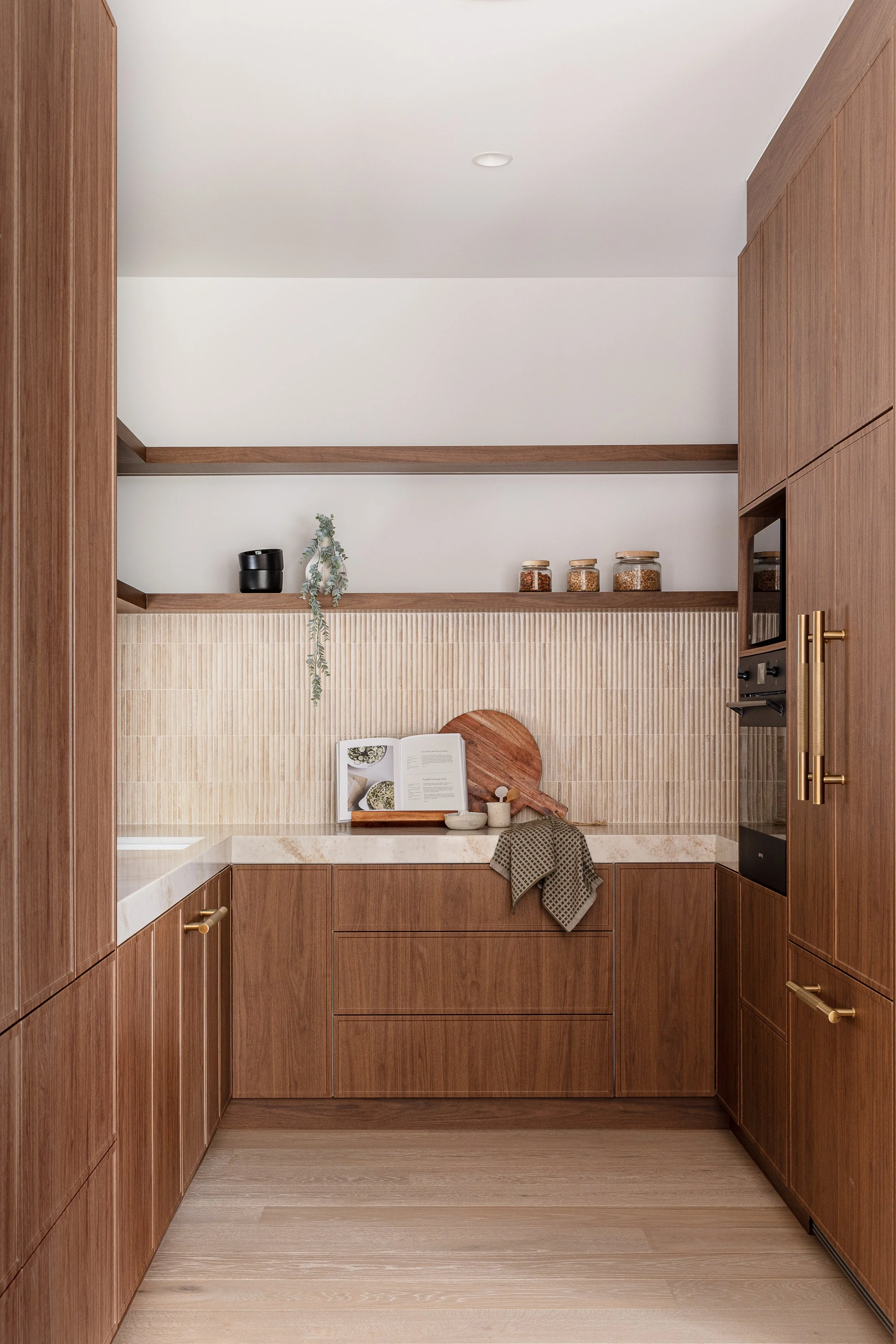 mid-century-modern-walnut-travertine-kitchen-butlers-pantry-open-shelving
