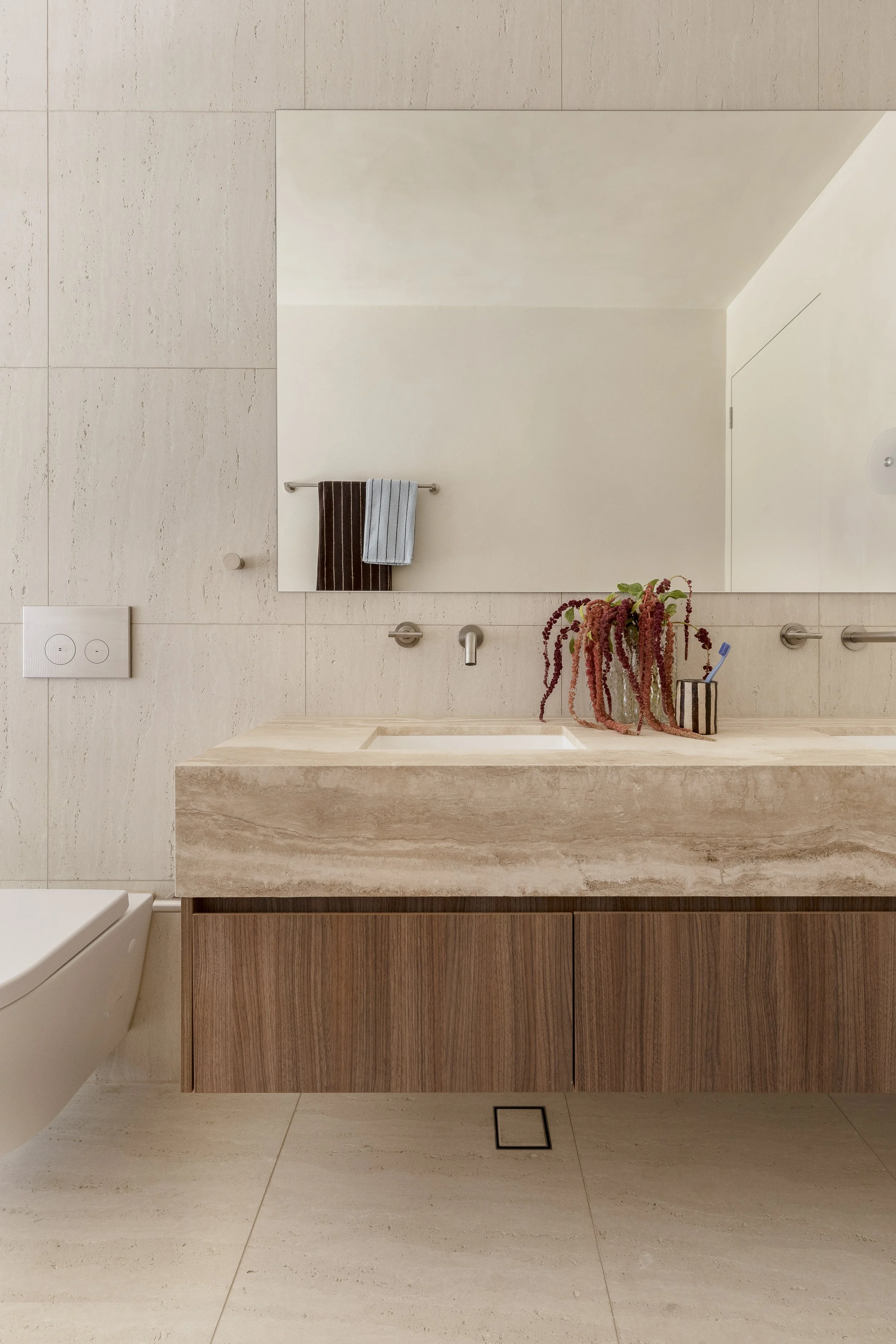 the valle casa neutral travertine double basin vanity bathroom