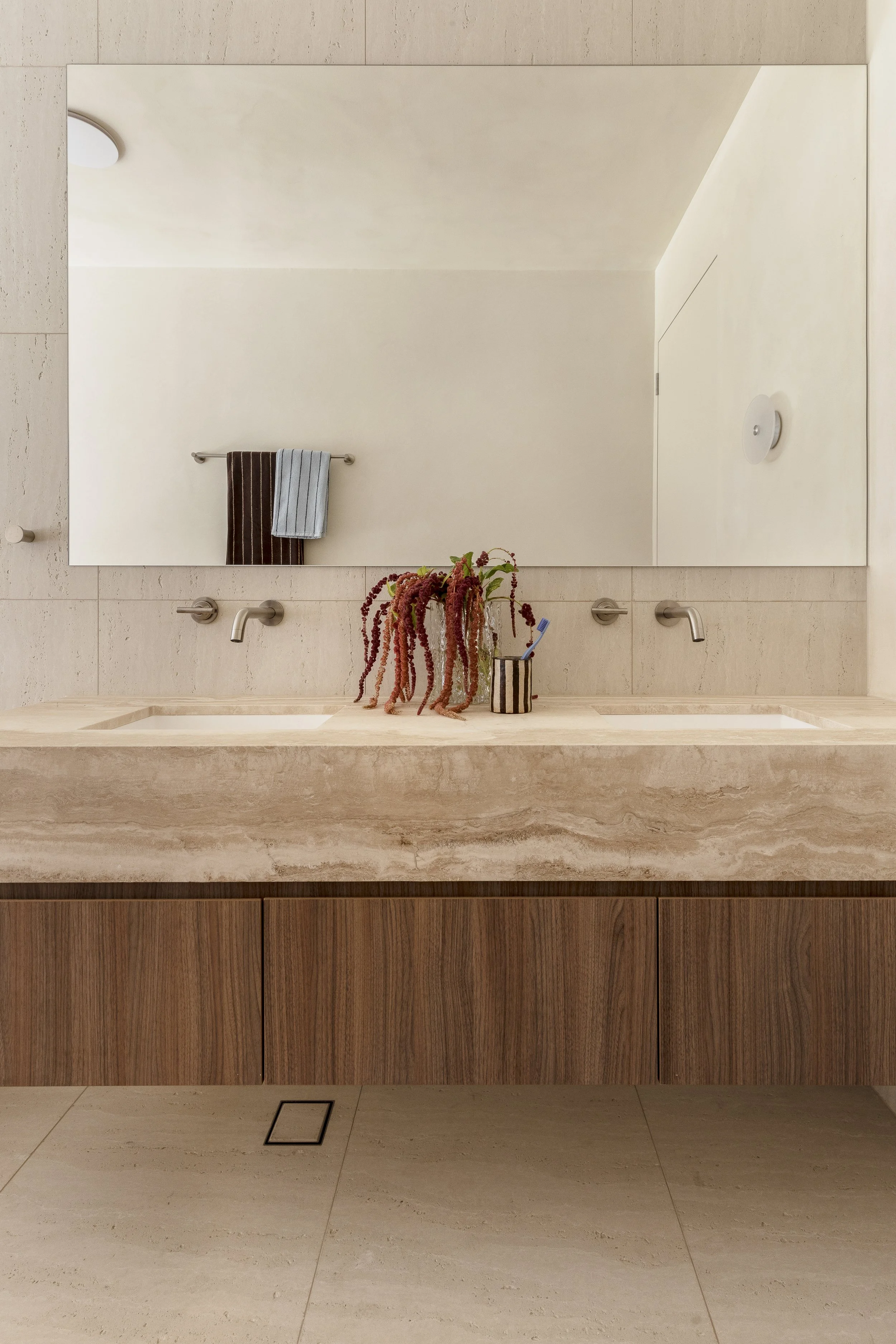 the valle casa neutral travertine double basin vanity bathroom