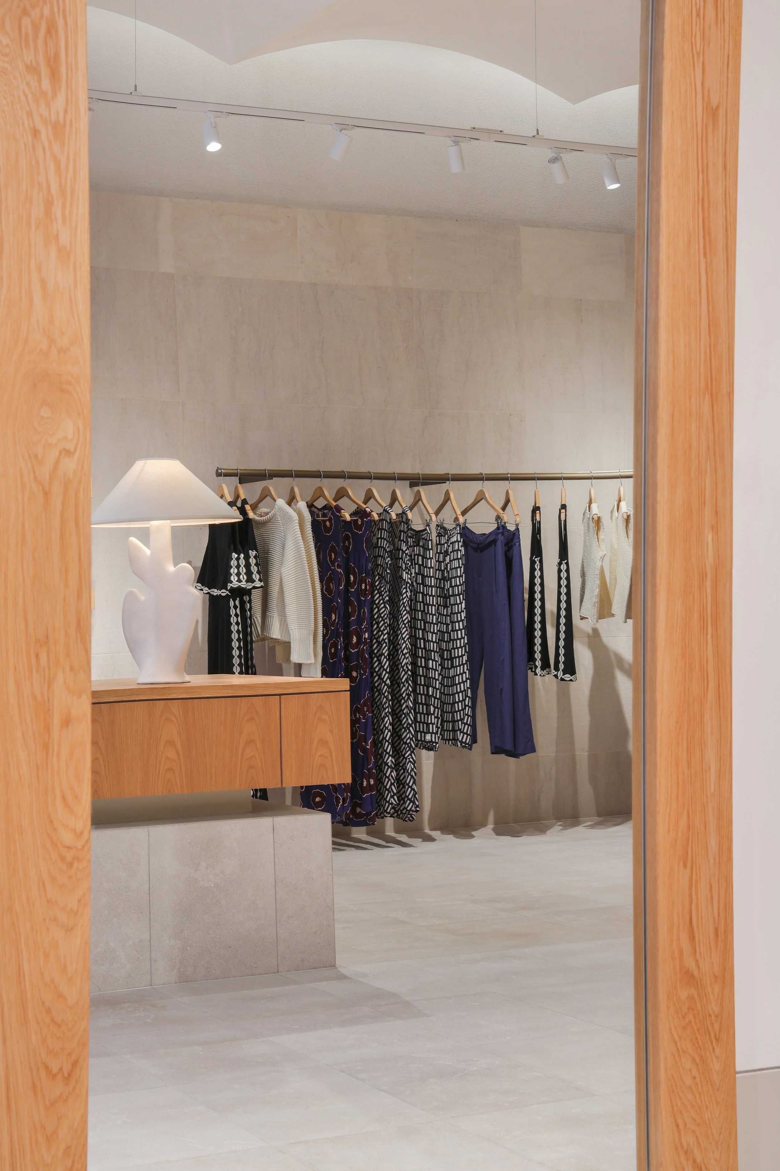 Mister-Zimi-Pacific-Fair-Boutique-warm-interior-clothing-rack