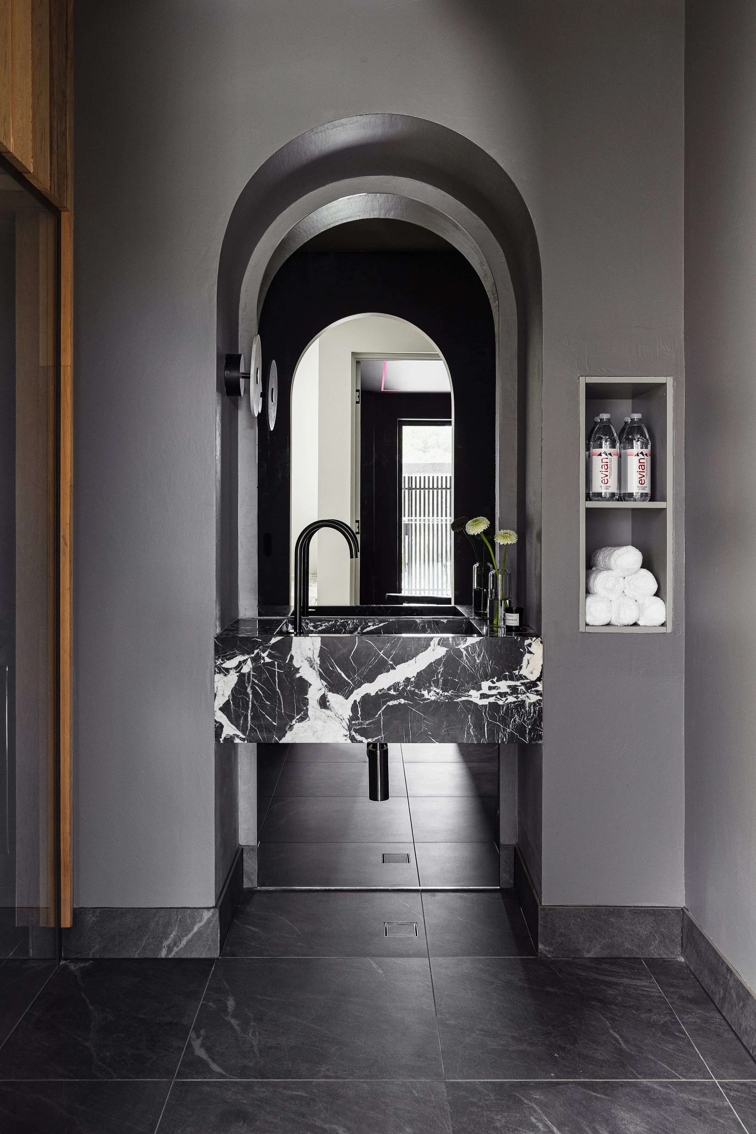 Monochrome-Dark-Powder-Room-Corchia-Marble-Brushed-Gunmetal