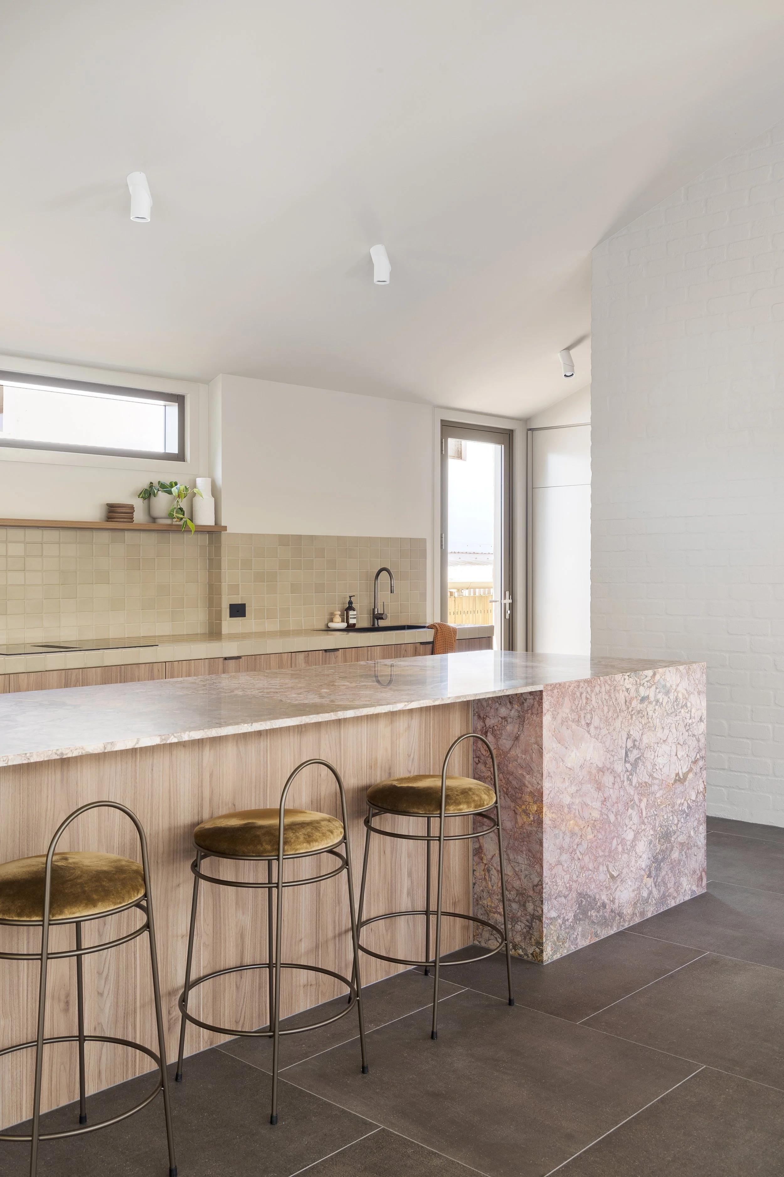 pink kitchen island industrial modern interior green velvet bar stools