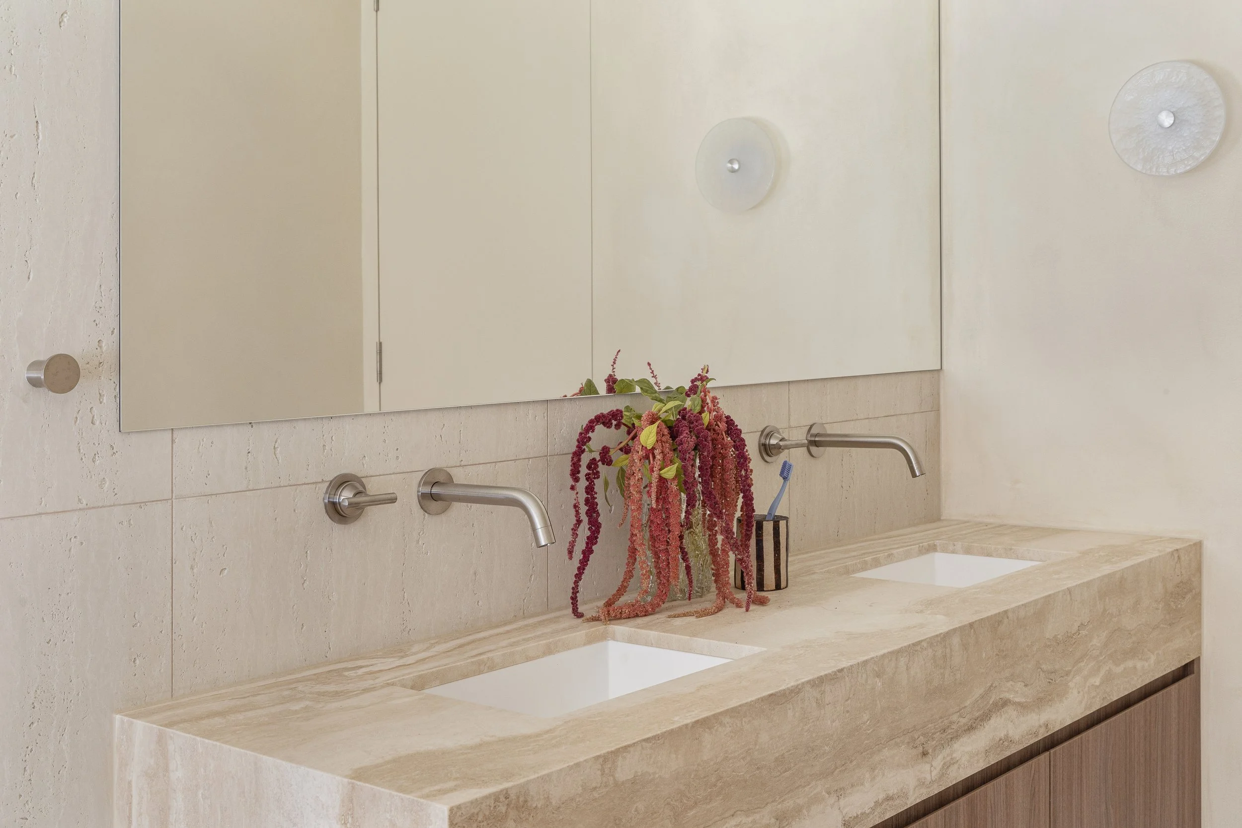 the valle casa neutral travertine double basin vanity bathroom