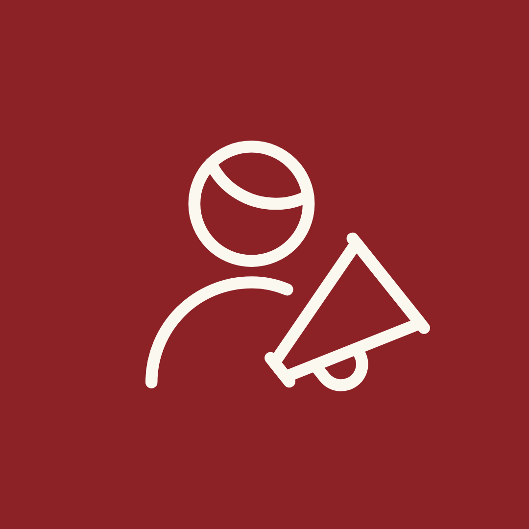 Outline of a shield with four puzzle pieces on a red background.