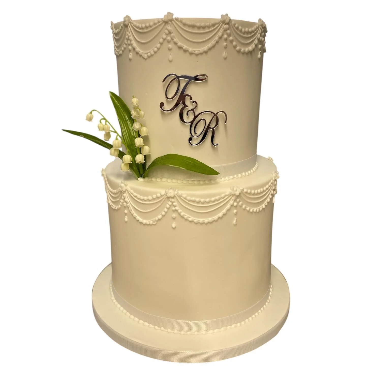 Chocolate gluten free and vanilla sponge cake tiers. Horrible weather today but let's hope the sun shone down inside for Rosie and Tom's wedding day.