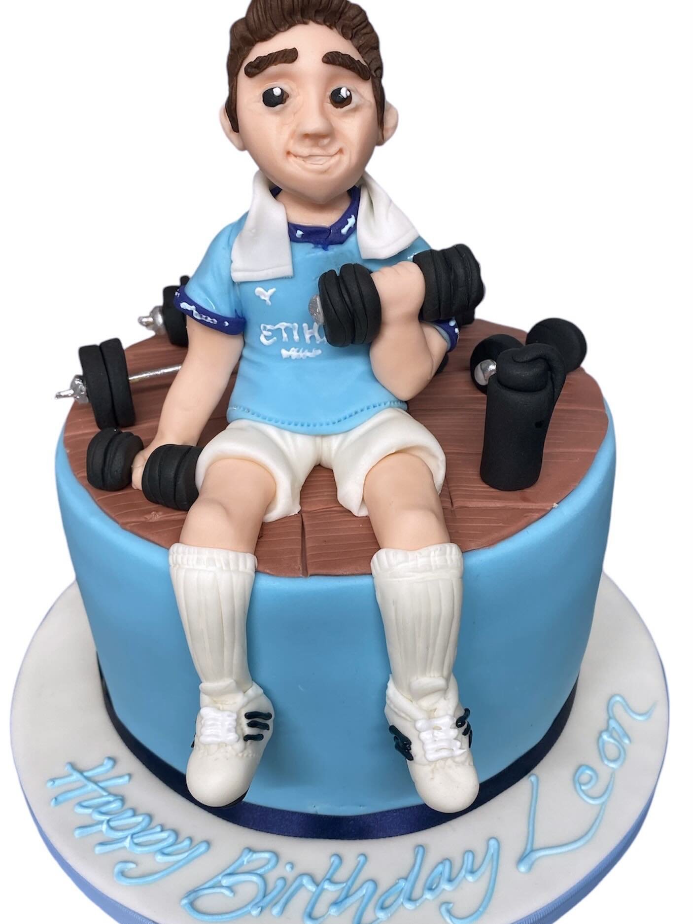 A few different gym  cakes from over the years