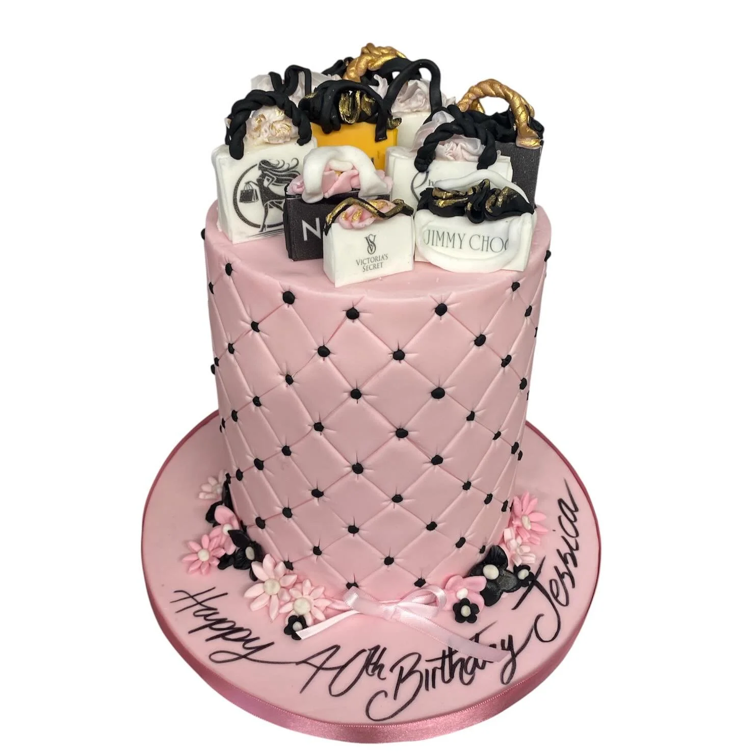 A tall shopping spree cake