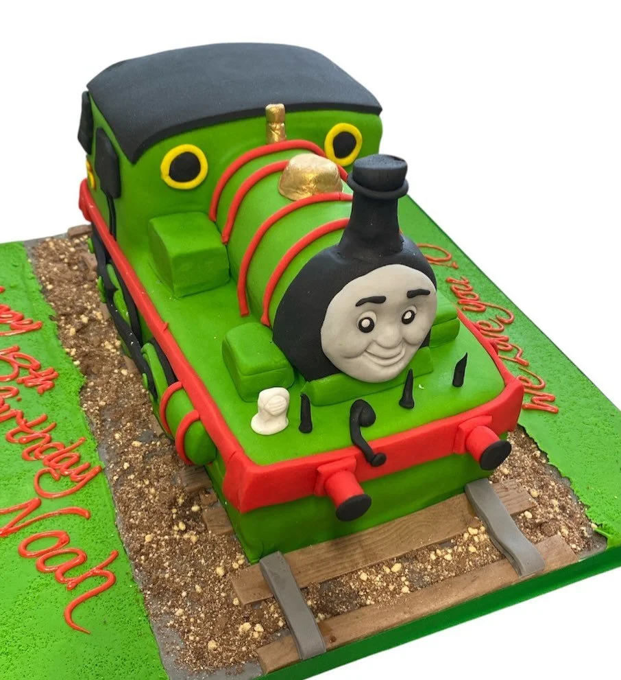 Every year this lad has a Thomas themed cake.  Hes now 18!
