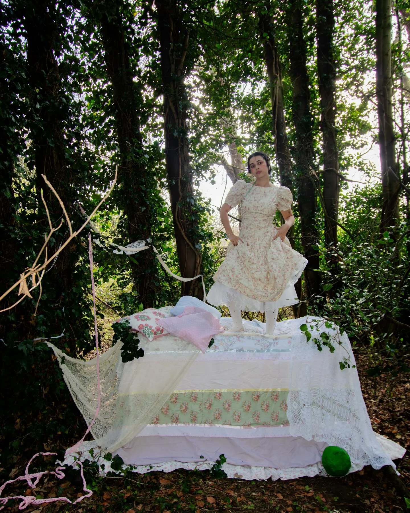 princess and the pea 🫛 part of my exploration of preservation series. I look at how traditional stories are preserved and reinterpreted. Photography, styling, creative direction and pea prop by me 🫛 modelled by @izzymelder 🫛 textile piece and set 