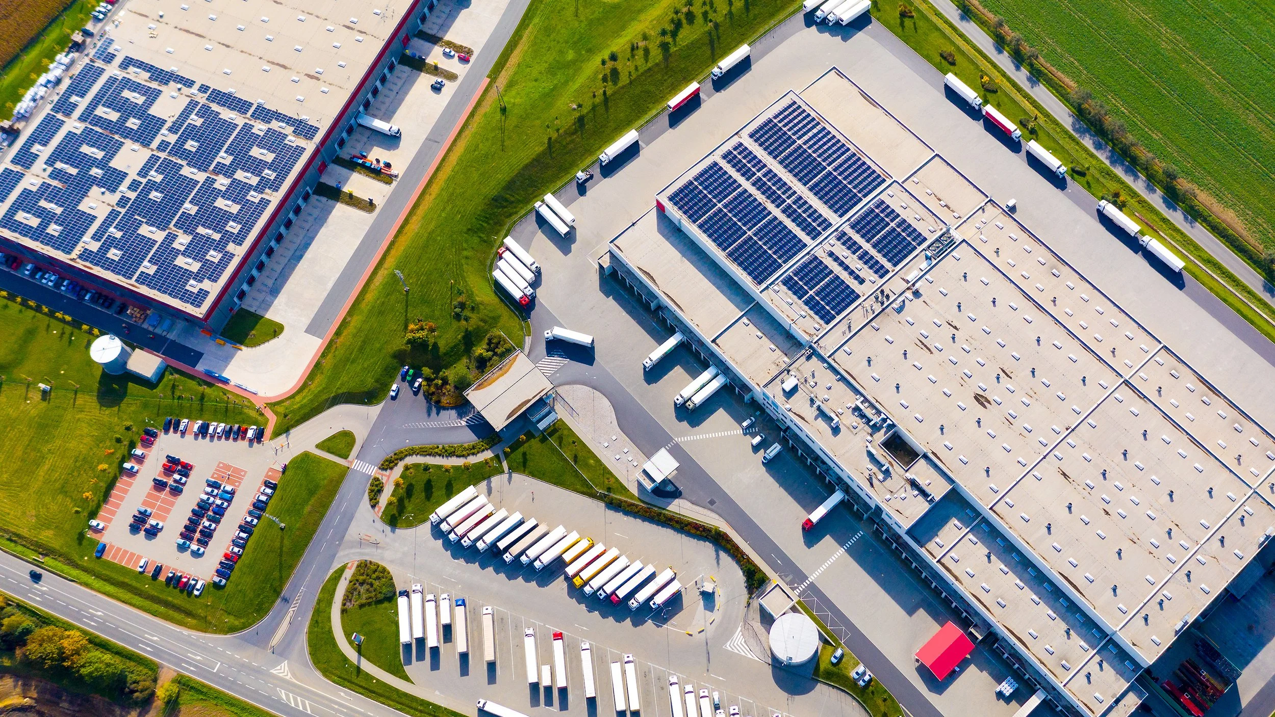 aerial view with warehouse and trucks