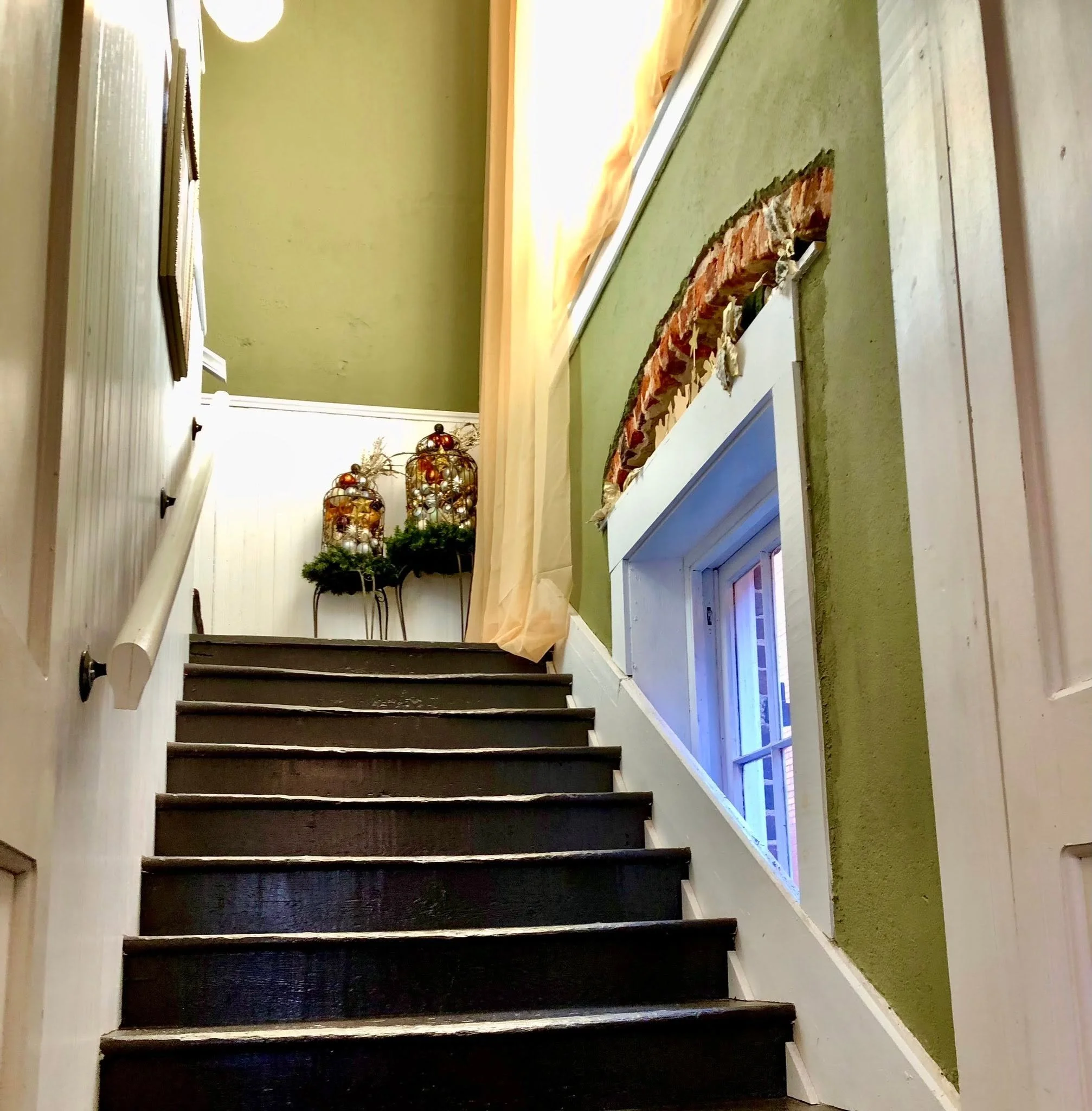 Yorkville Enquirer stairway with Christmas decorations