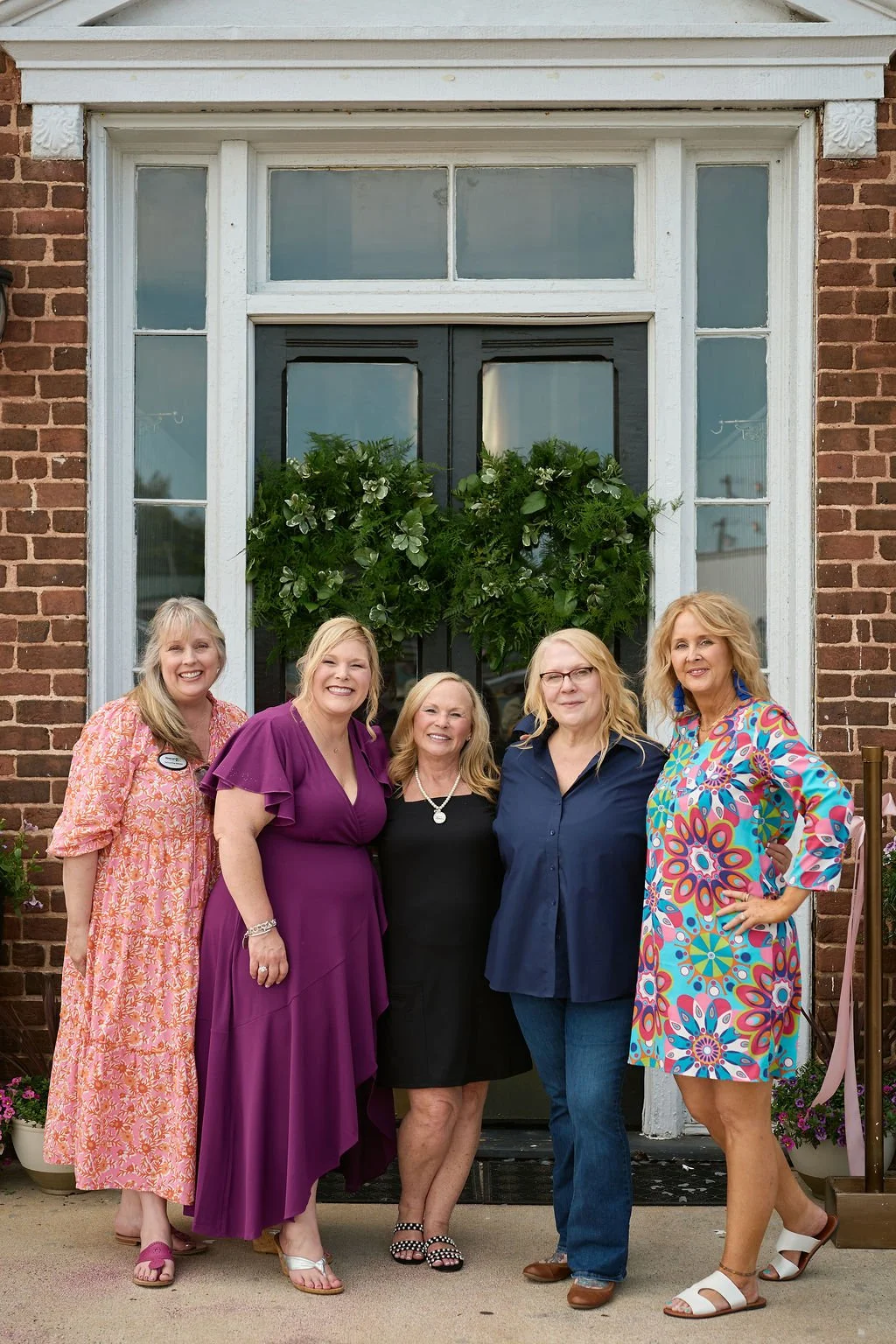 group-ladies-smiling-outside.jpg