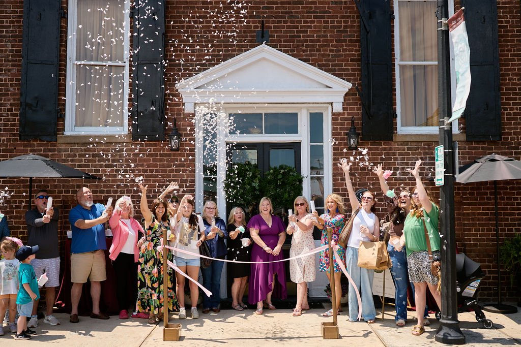 group-celebrating-outside-yorkville-enquirer.jpg