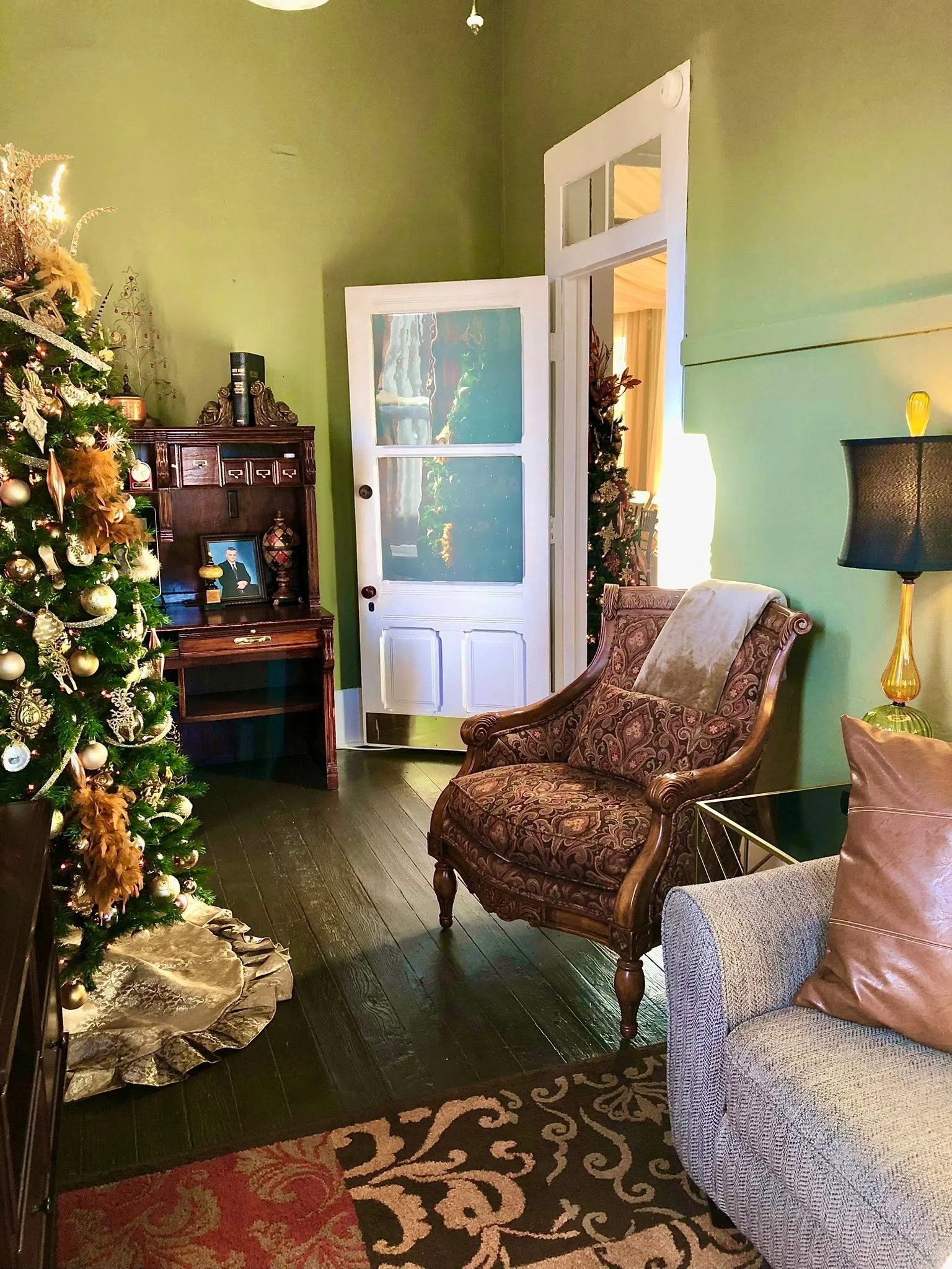 sitting are with Christmas tree