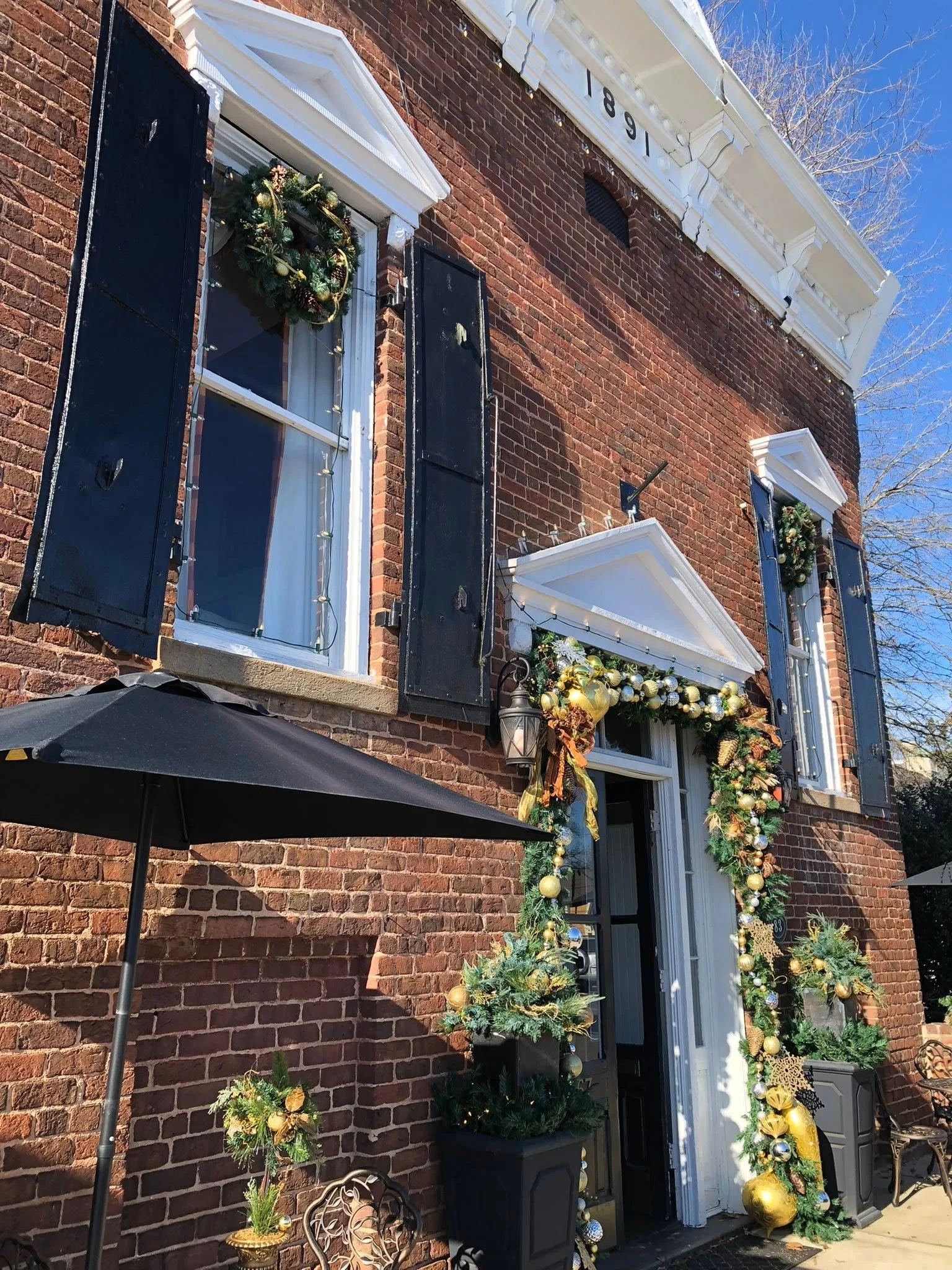 exterior of The Yorkville Enquirer decorated for Christmas