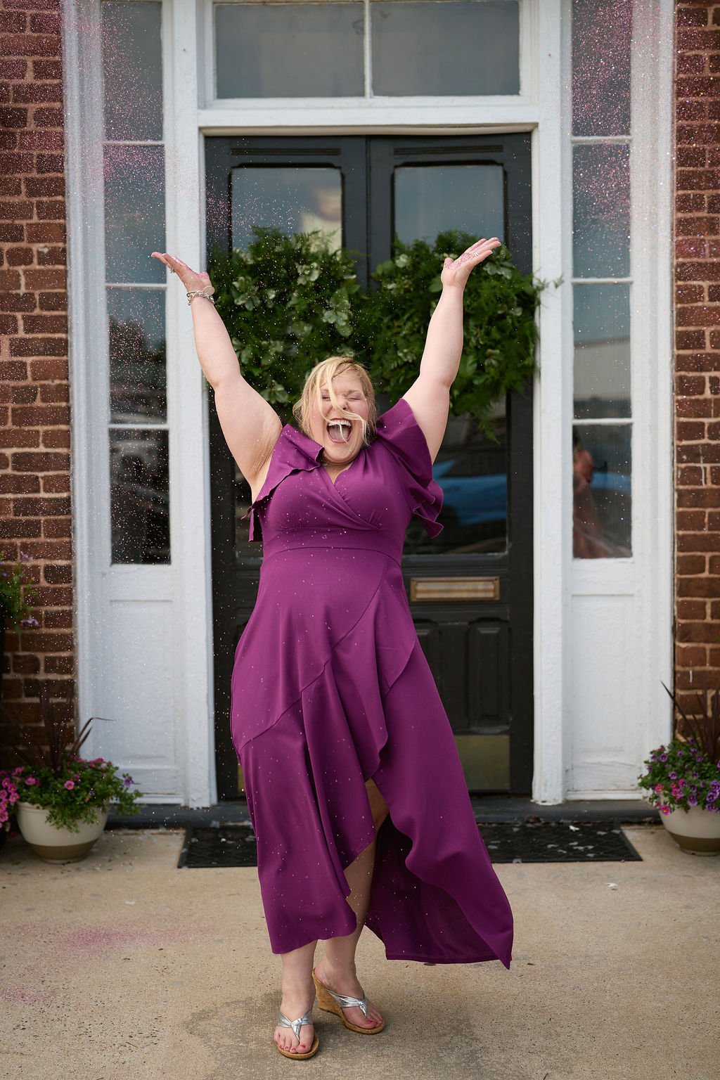 erika-jacobs-arms-up-celebrating.jpg