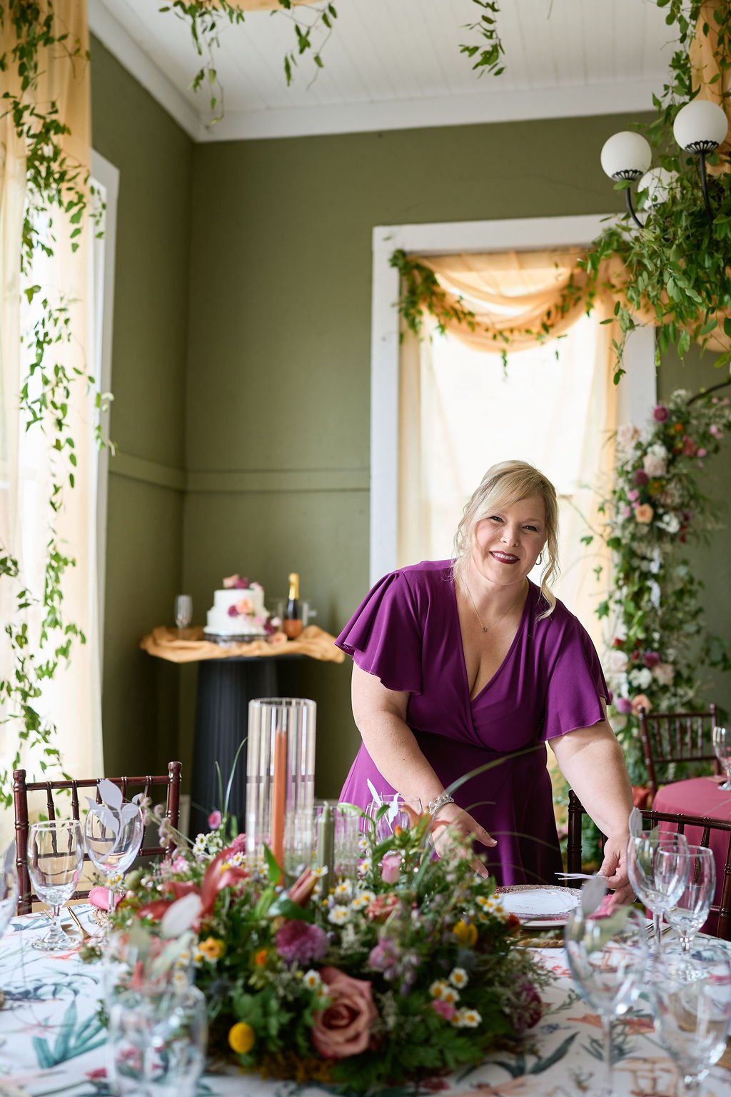Erika Jacobs setting a table for an event