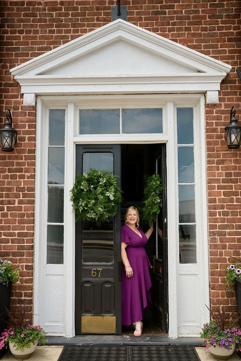 Erika Jacobs standing in doorway of The Yorkville Enquirer
