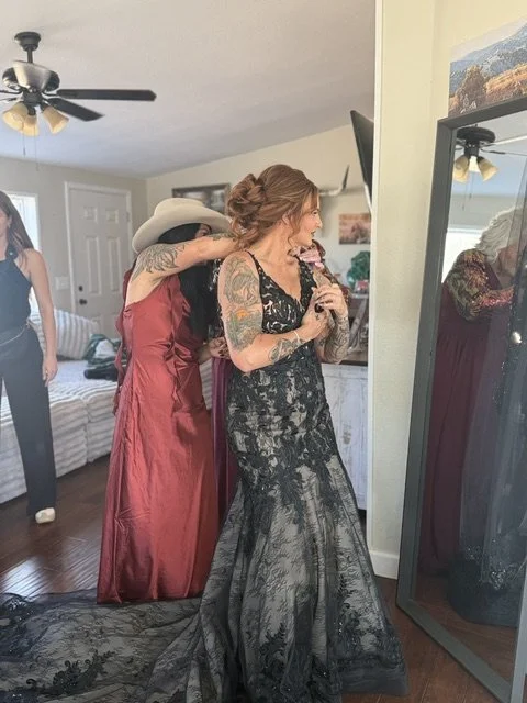 Mom helping her daughter, bride getting ready