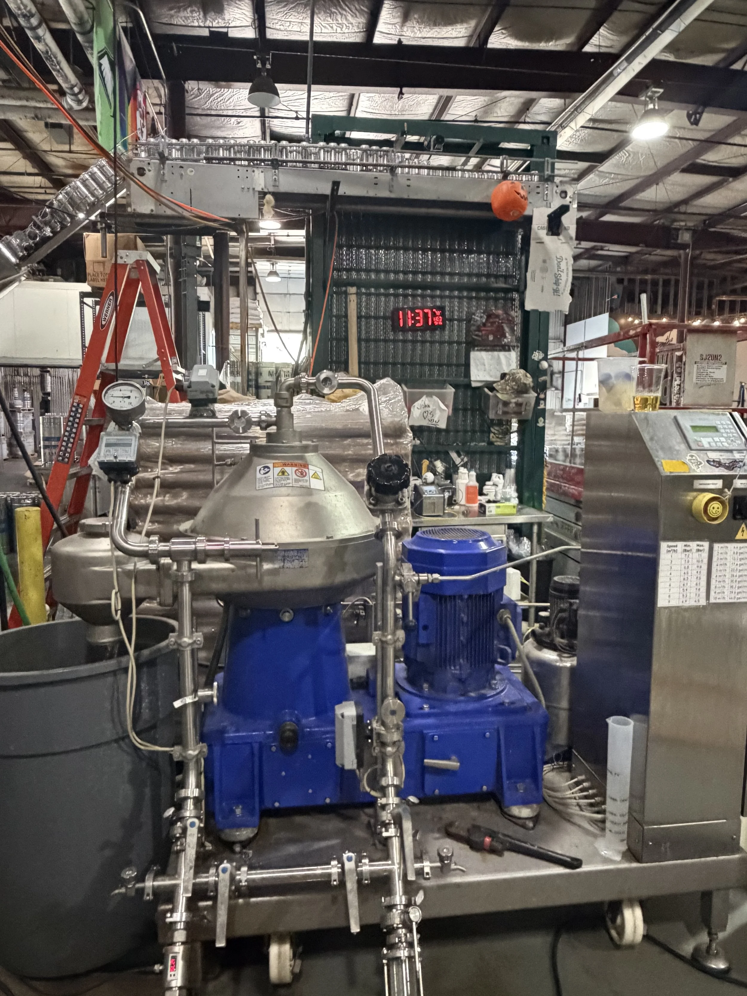 Centrifuge machine on production floor at Castle Island Brewing Company