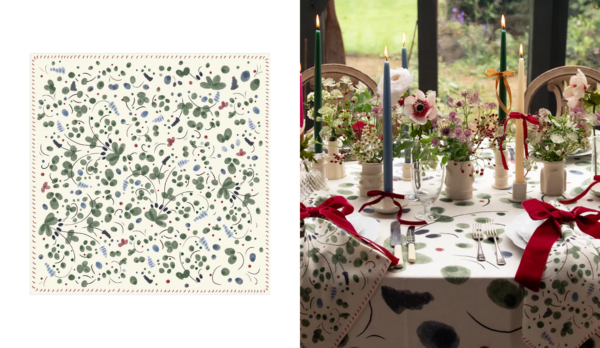 Table setting with floral tablecloth, vases of flowers, lit candles, and red ribbons, with a window and garden in the background.
