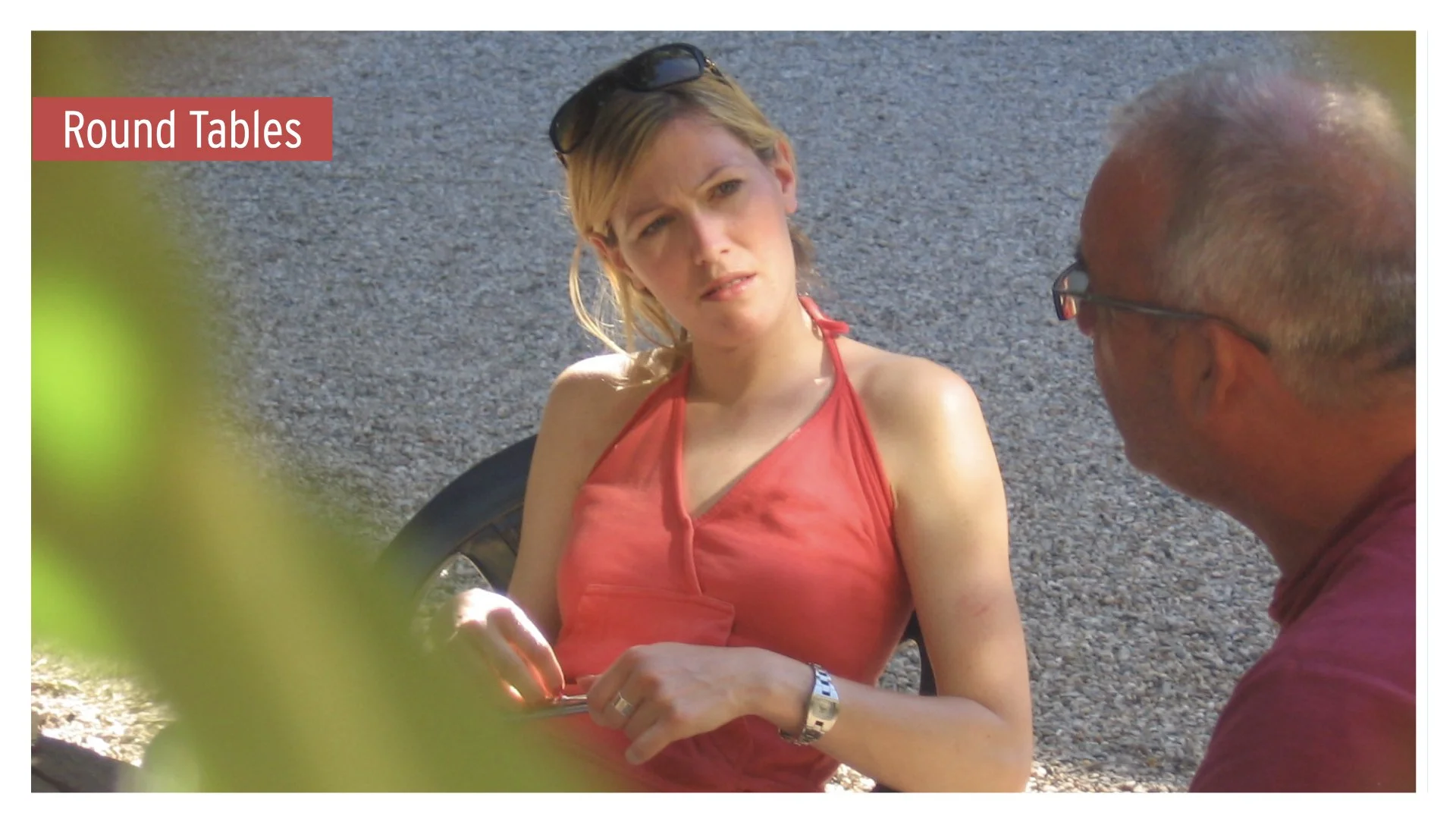 A Round Table conversation between a woman and a man.