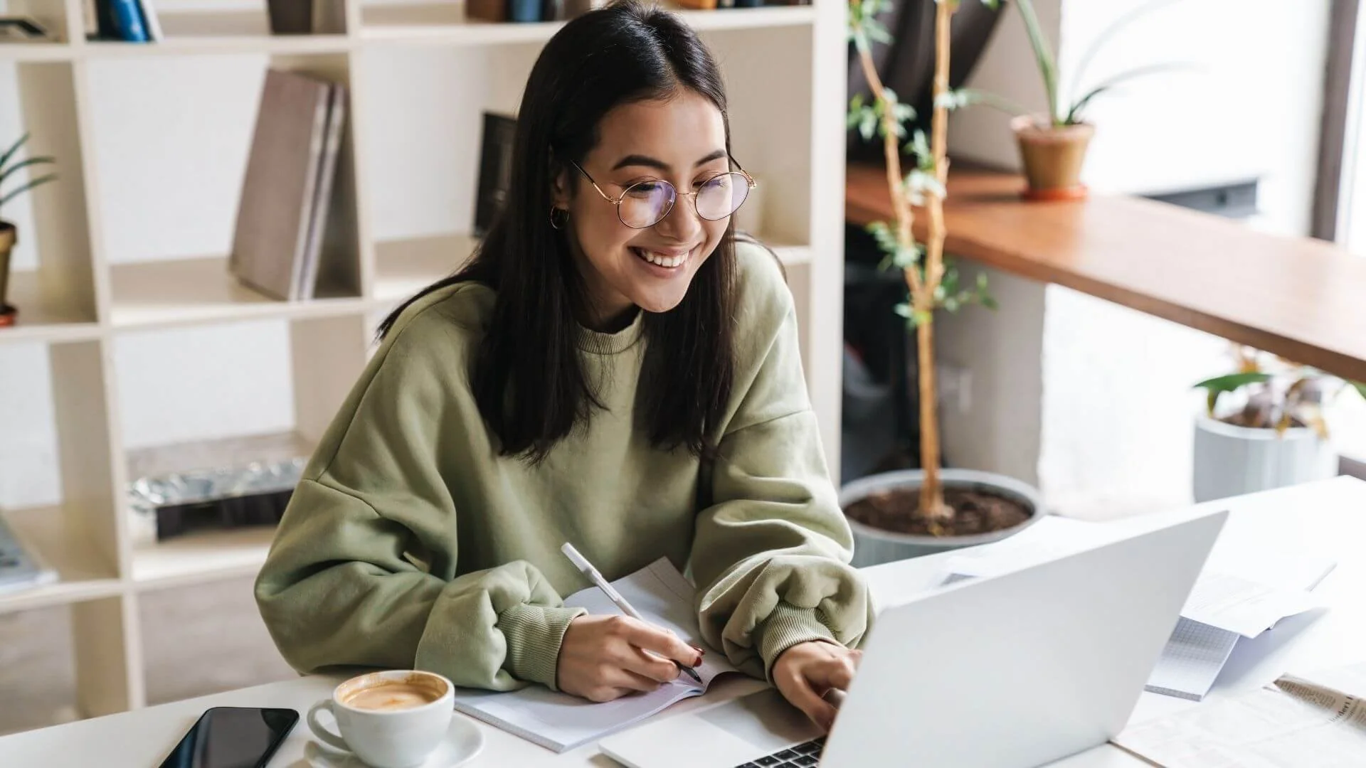 person who's happy at their computer