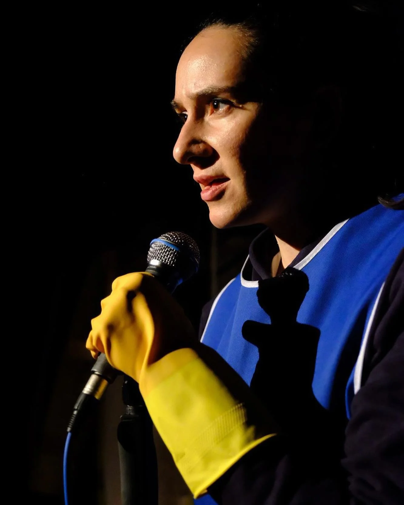 Today is Labour Day.

We stand with workers, especially migrant workers whose labour is essential yet constantly exploited, underpaid, and criminalised.

This photo is from our 2019 show ILLEGALISED, where Oana Pușcatu plays a Romanian migrant singin