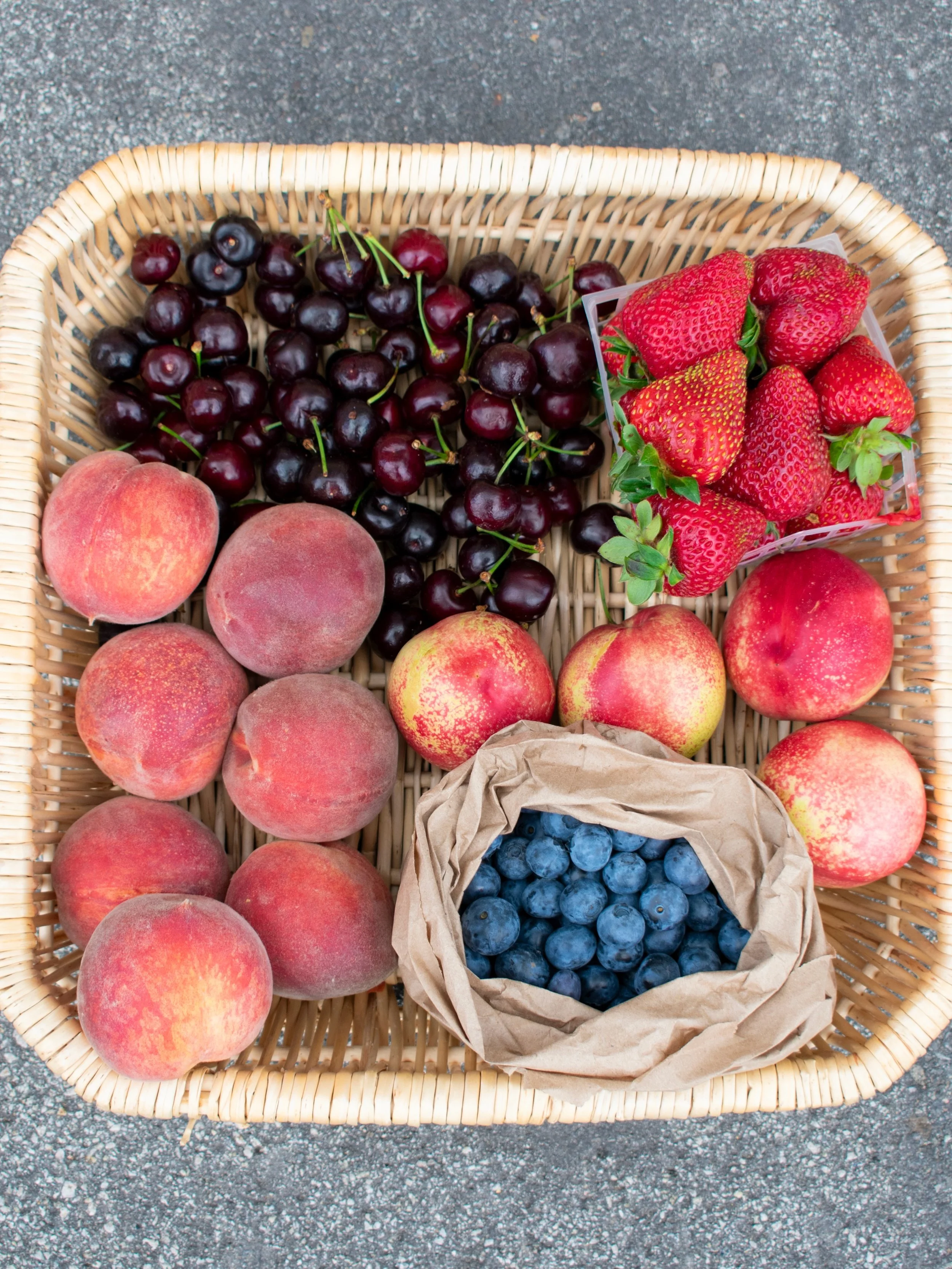 The Fruit Box Is Back! 🍓🫐

Want all the best of spring and summer fruit? Grab a Fruit Box! Each week is a curated mix of 4 - 6 fruits from our local growers. This past week the box had blueberries, peaches, cherries, strawberries, and nectarines! 
