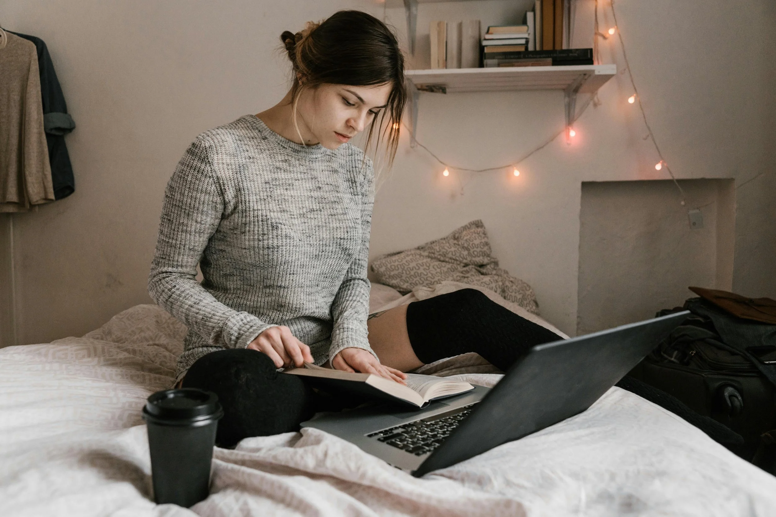 Teen girl studying alone while struggling with perfectionism and feeling pressure to succeed academically