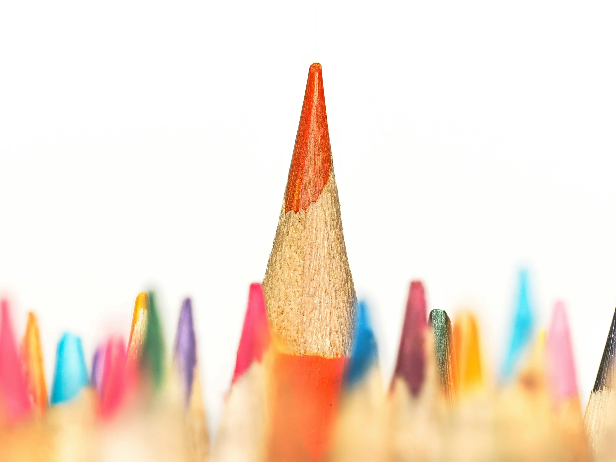 Orange pencil standing out among colored pencils - symbolizing how some kids feel singled out by behavior systems.