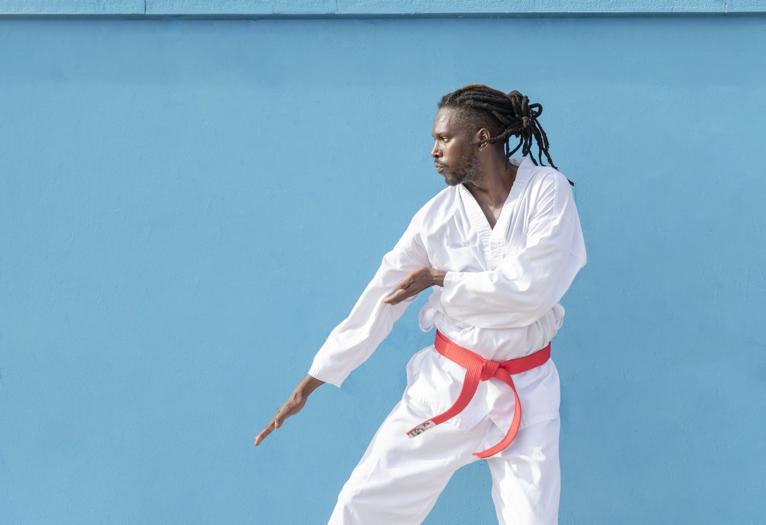 a-young-african-american-man-training-taekwondo-ou-2025-03-13-01-23-41-utc.jpg