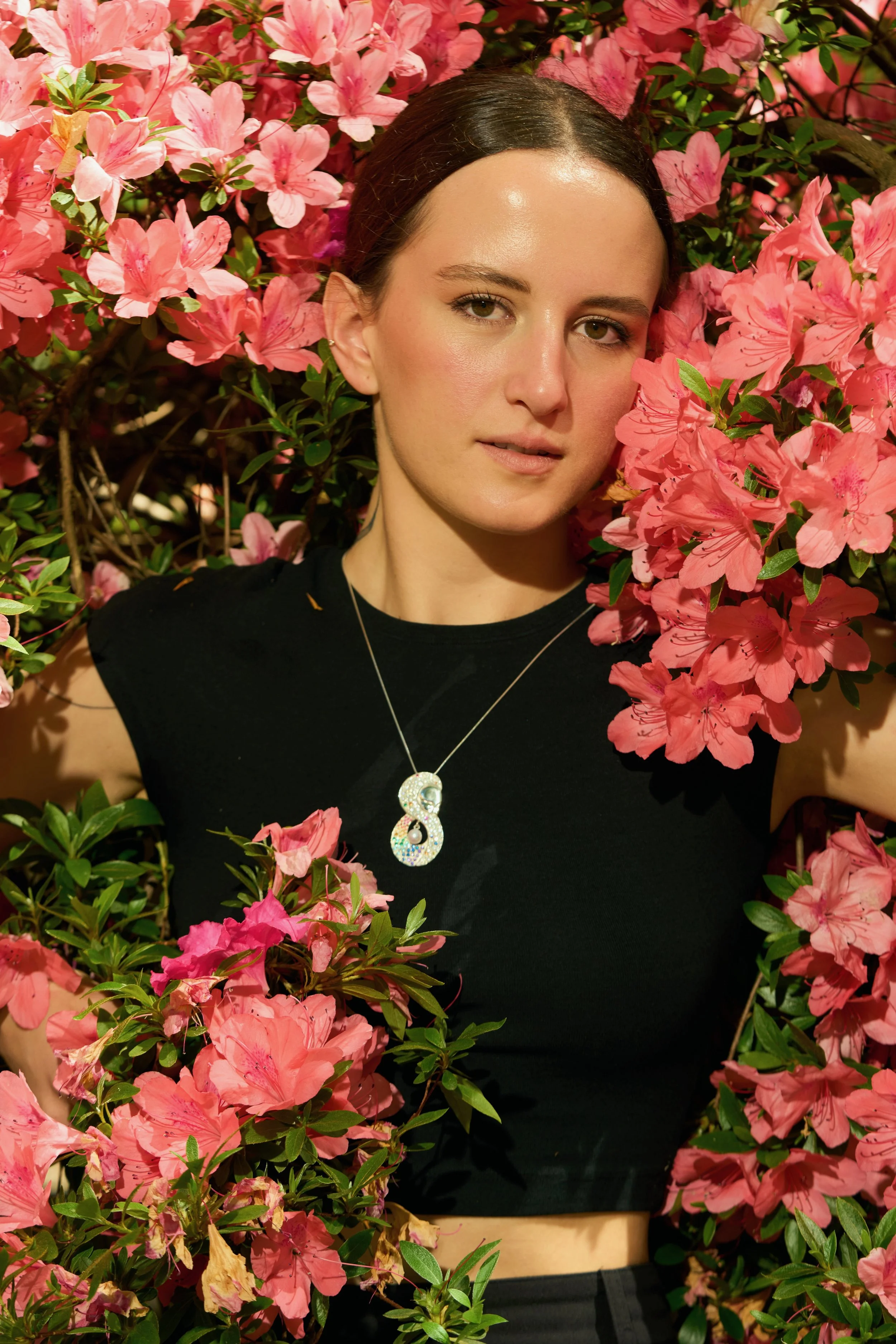 Seen Not Heard pendant, modeled by Lucia Rodriguez