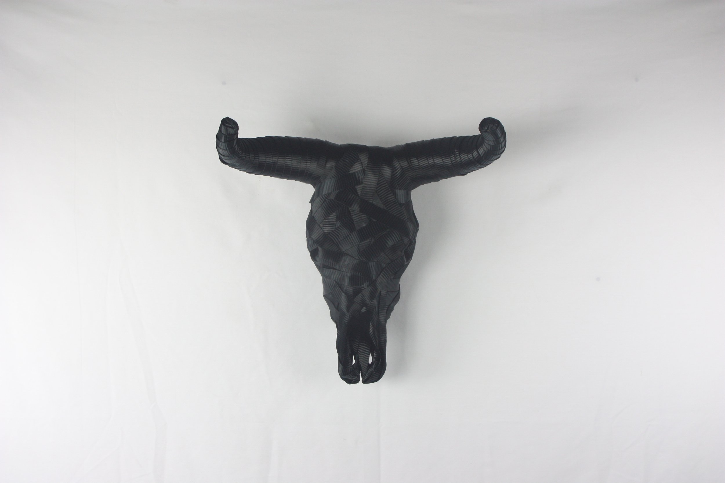 "Black Cow", 2025
ratchet straps, cow skull
20" x 14" x 20"