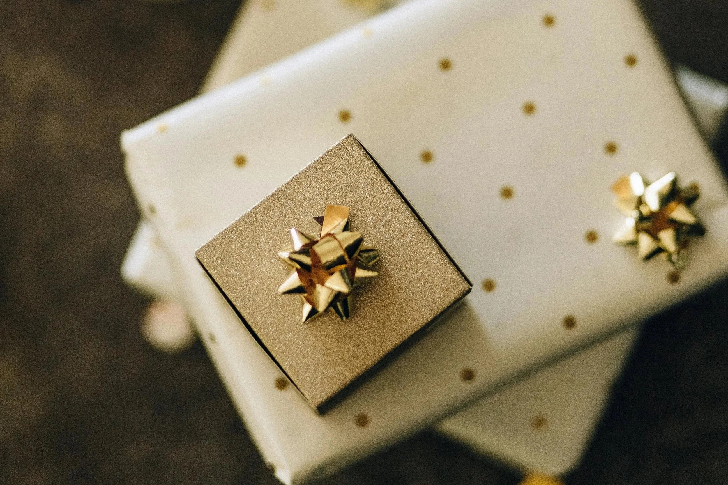 Overhead picture of beautifully wrapped gold presents