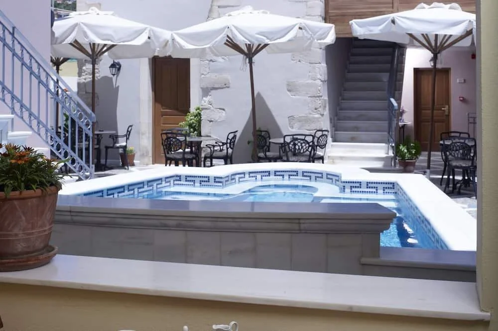 • Outdoor swimming pool  • 20 Rooms with En-suite bathrooms  • Bar  •  Kitchen • Junior Suites  • Maisonettes • Suites •  Superior •  Double Rooms •  Private Parking