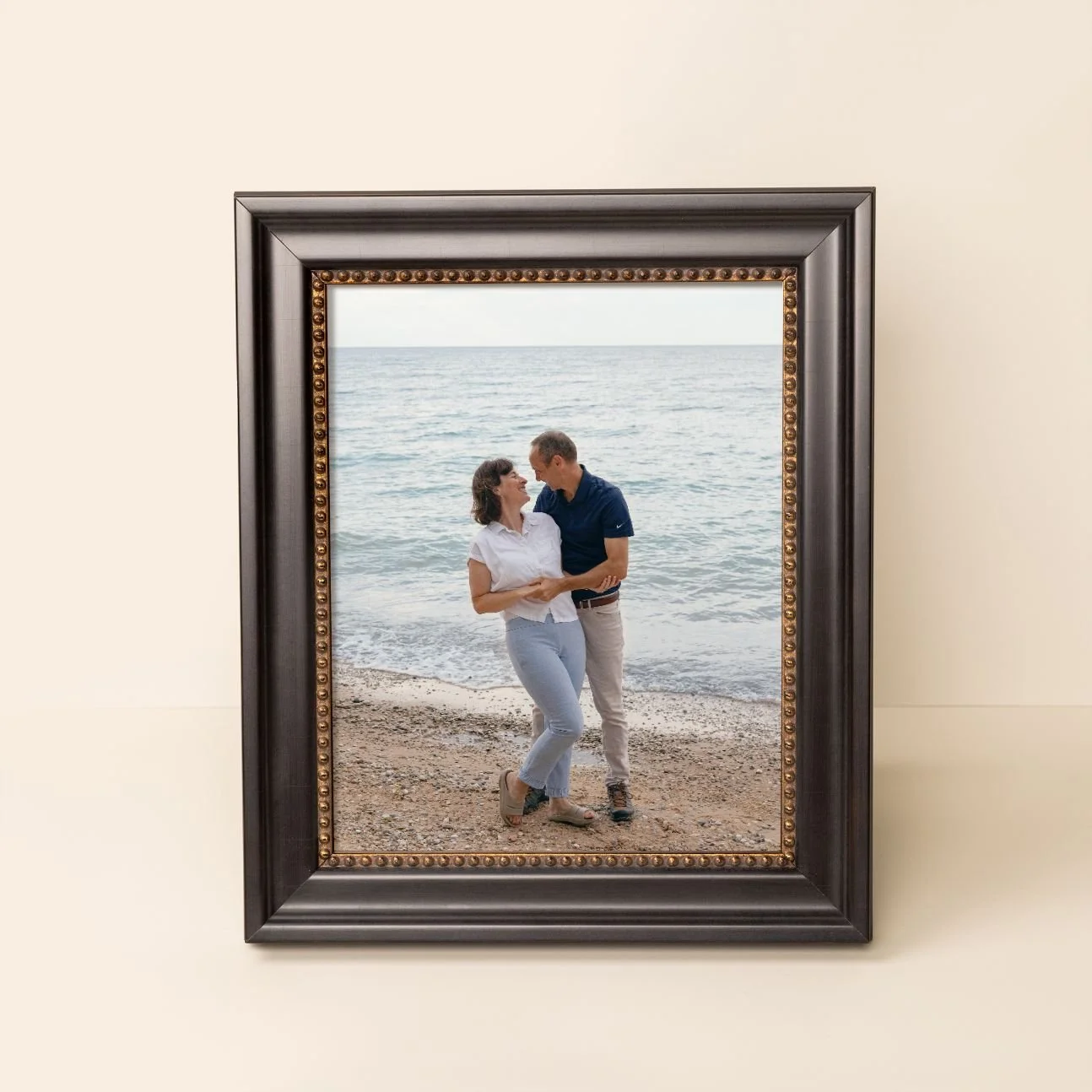 Close-up view of a brown leather surface with visible texture and grain.
