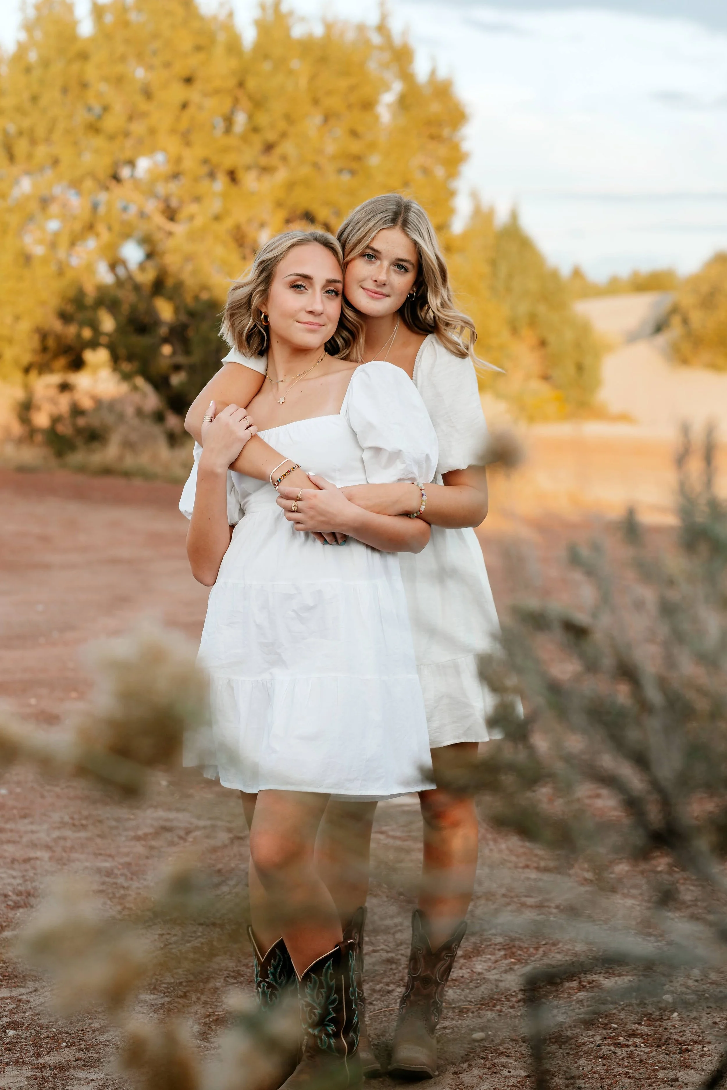Heirloom true to color golden friend portrait in nevada sand dunes with natural light