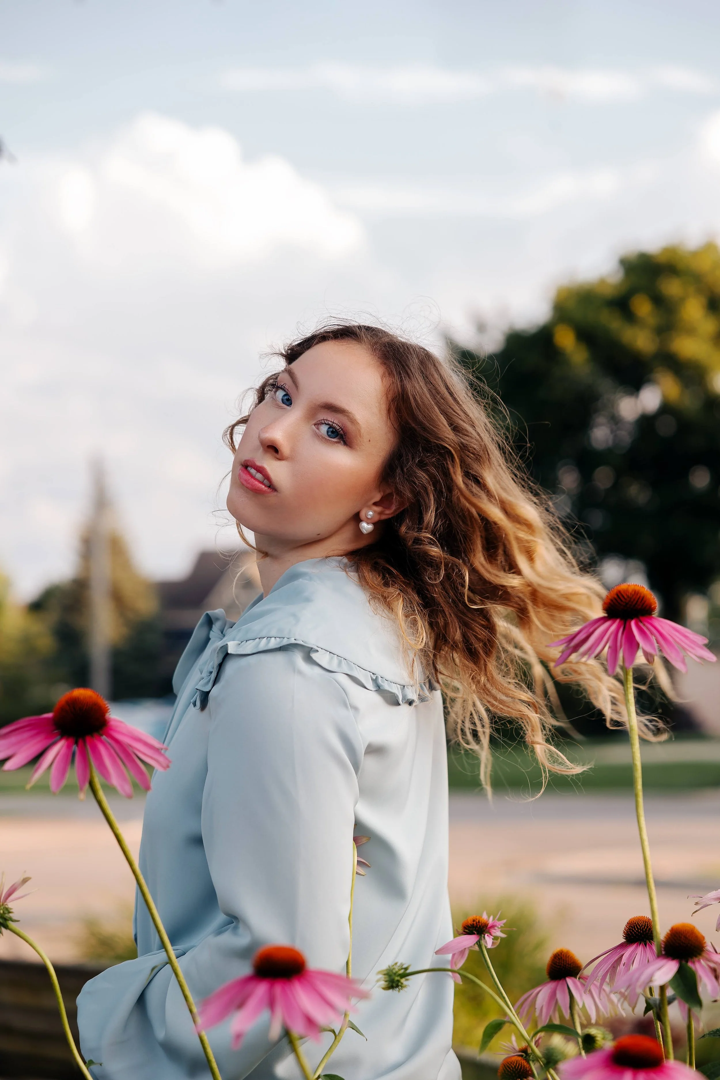 Heirloom true to color senior portrait in Henderson with natural light and flowers