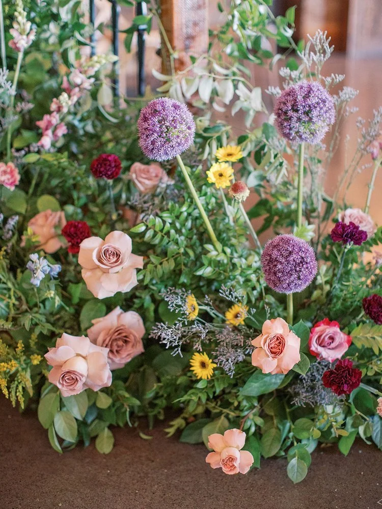 Purple yellow and pink organic wedding wildflowers