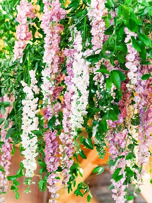 Hanging flowers in barn wedding
