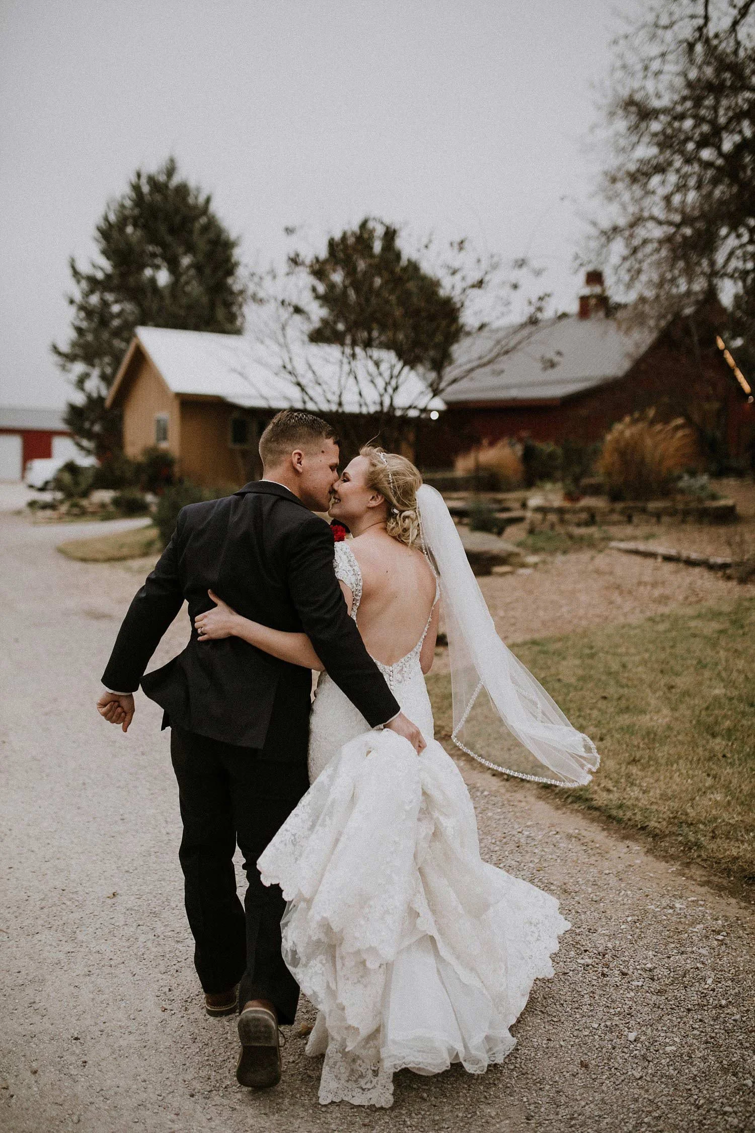 Hollow Hill Farm Event Center Wedding bride and groom walking away