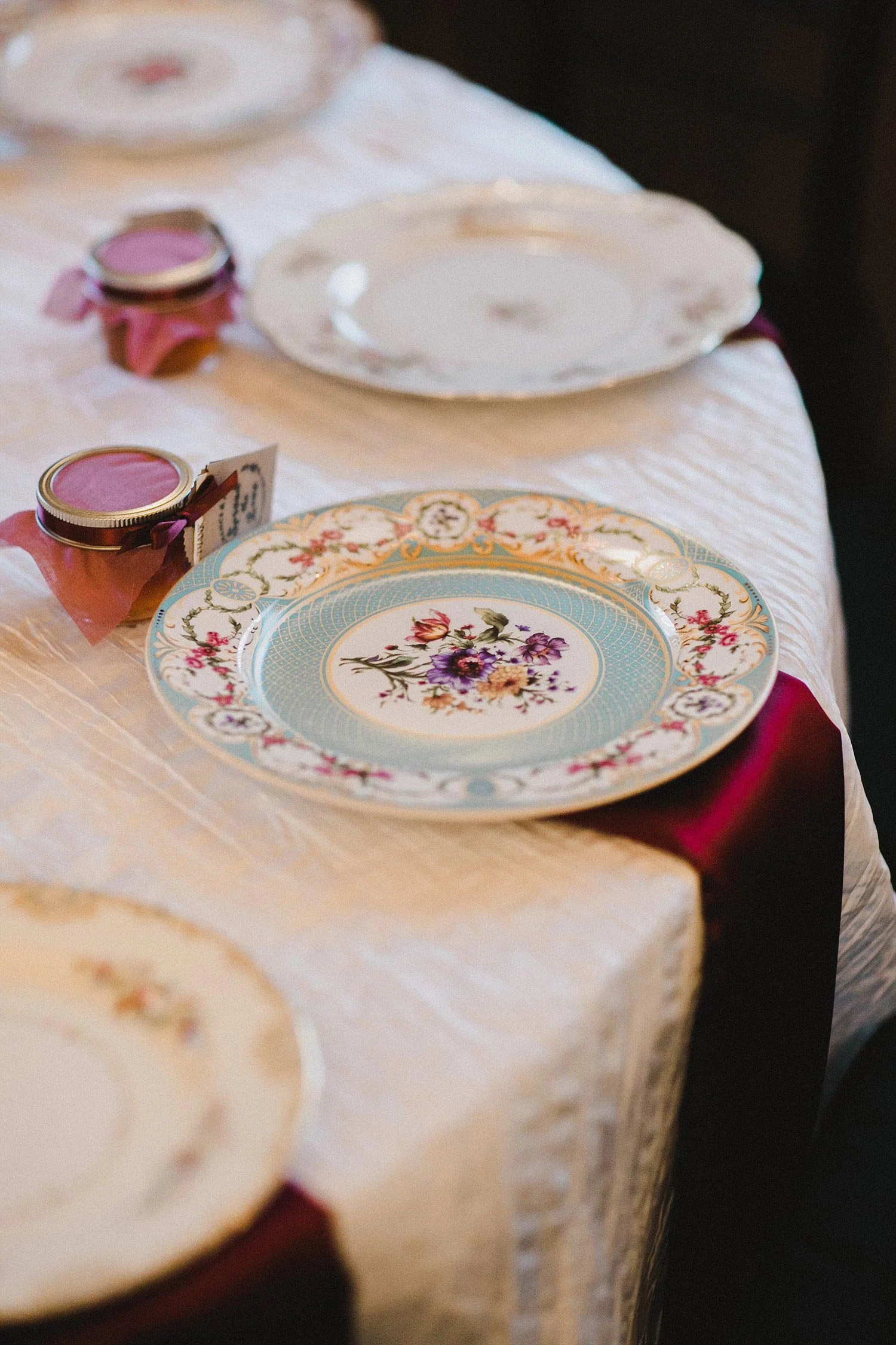 Hollow Hill Farm Event Center Wedding vintage china place setting with jam jar favor