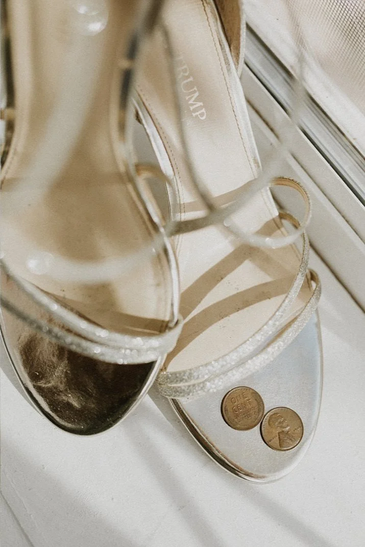 Nude wedding shoes with penny in shoe