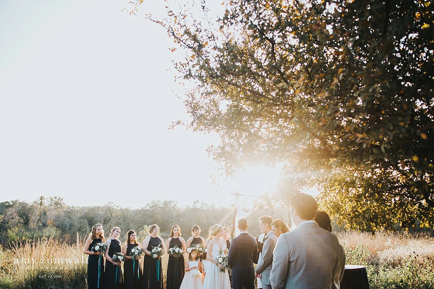 Trinity river audubon center wedding ceremony in the butterfly garden
