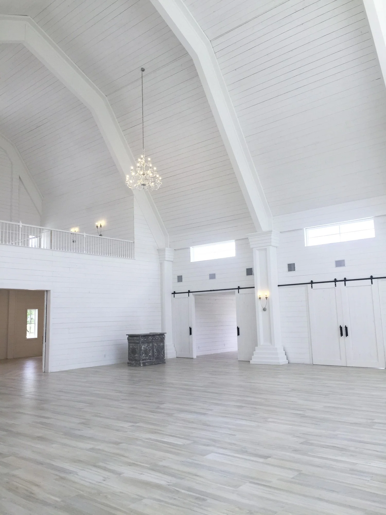 The Nest at Ruth Farms denton wedding venue's interior barn doors