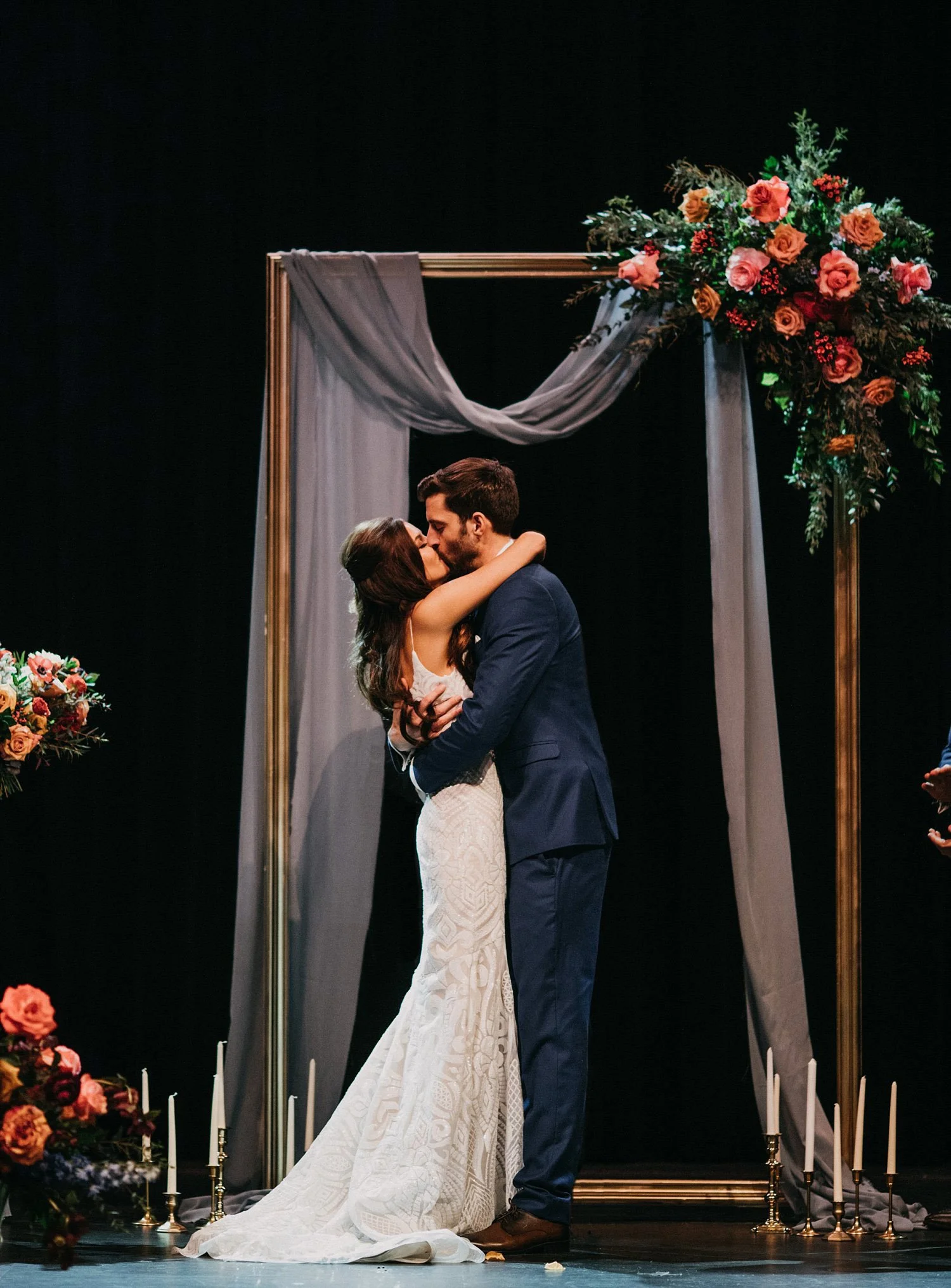 ornate gold frame archway with grey fabric