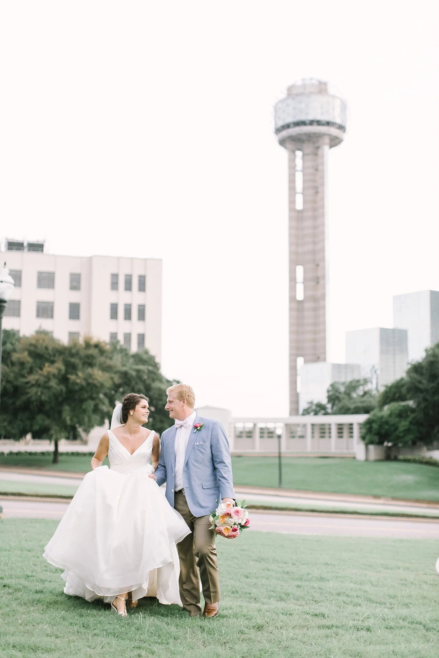 Dallas wedding couple picture with reunion tower in the background