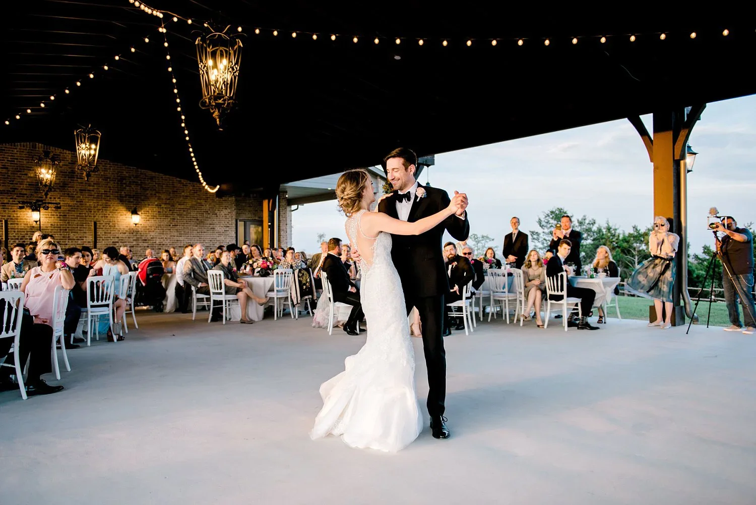 Bride and Groom reception under the pavilion at dove ridge vineyard